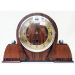 A mid 20th Century Art Deco style walnut cased mantel clock with eight day Westminster chiming