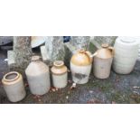 A quantity of assorted stoneware bottles and jars