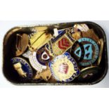 A collection of vintage enamelled lapel and pin badges for various national bowling clubs and