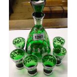 An Italian silver flashed green glass liqueur set