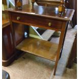 A 27" Edwardian mahogany side table with partitioned drawer and undertier set on slender square
