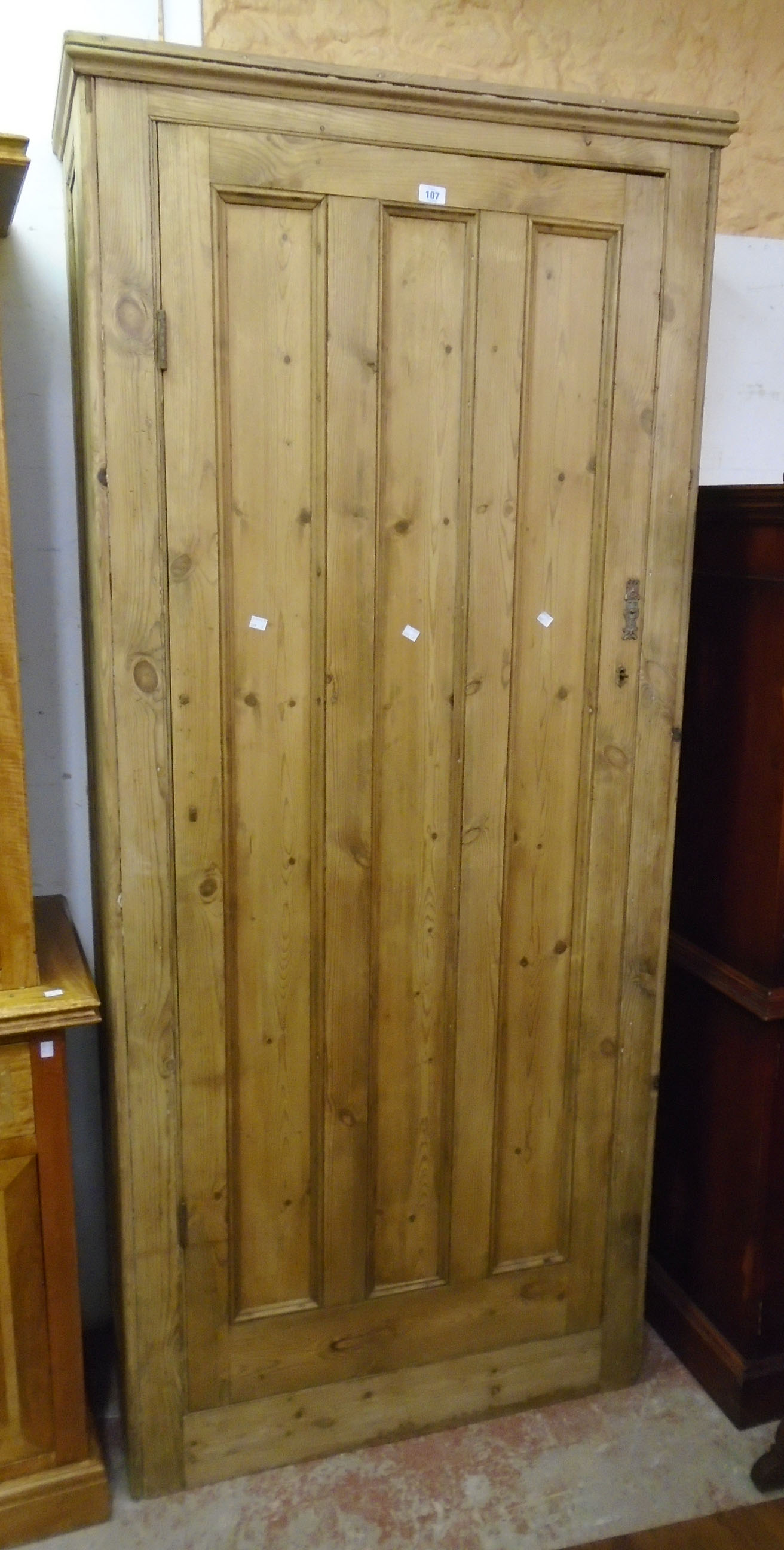 A 3' 2" 19th Century waxed pine larder cupboard with six shelves enclosed by a panelled doors - 7' 1