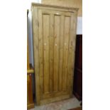 A 3' 2" 19th Century waxed pine larder cupboard with six shelves enclosed by a panelled doors - 7' 1