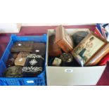 Two boxes containing various trinket boxes including a miniature sofa table