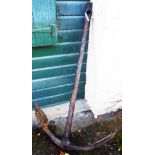 A 5' dive recovered antique anchor with spade shaped flukes