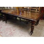 A 6' 19th Century mahogany extending dining table with moulded edge and single leaf, set on turned