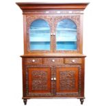 A 4' mid 19th Century Chinese colonial cabinet with glazed top section enclosing shelves, over a