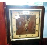 A mid 20th Century polished oak granddaughter clock with J. W. Benson eight day Westminster