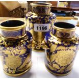 A pair of continental cobalt blue jars with gilt floral and insect decoration - sold with a larger