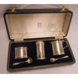 A cased silver three piece condiment set - Birmingham 1973