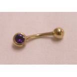 A 9ct. gold stone set body piercing