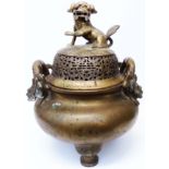 A 21" large 17th-18th Century Chinese bronze censer with lion chimney to pierced and incised lid