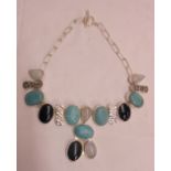 A Hi-Ho silver limited edition necklace, set with polished natural turquoise, moonstones and black