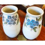 A pair of 7" Royal Baron vases with floral band to top