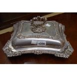 A Walker & Hall silver plated entree dish with cast decoration and detachable handle