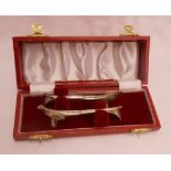 A cased pair of 1977 silver pheasant pattern knife rests - silver jubilee souvenir