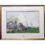 Hutton Mitchell: a gilt framed watercolour, depicting cattle grazing in a meadow - signed - 13 3/