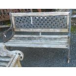 A 4' 1" reproduction cast iron and teak slatted garden bench