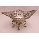 A 7 1/2" pierced silver bonbon dish (a/f), set on ornate cast stand by William Hutton & Sons -