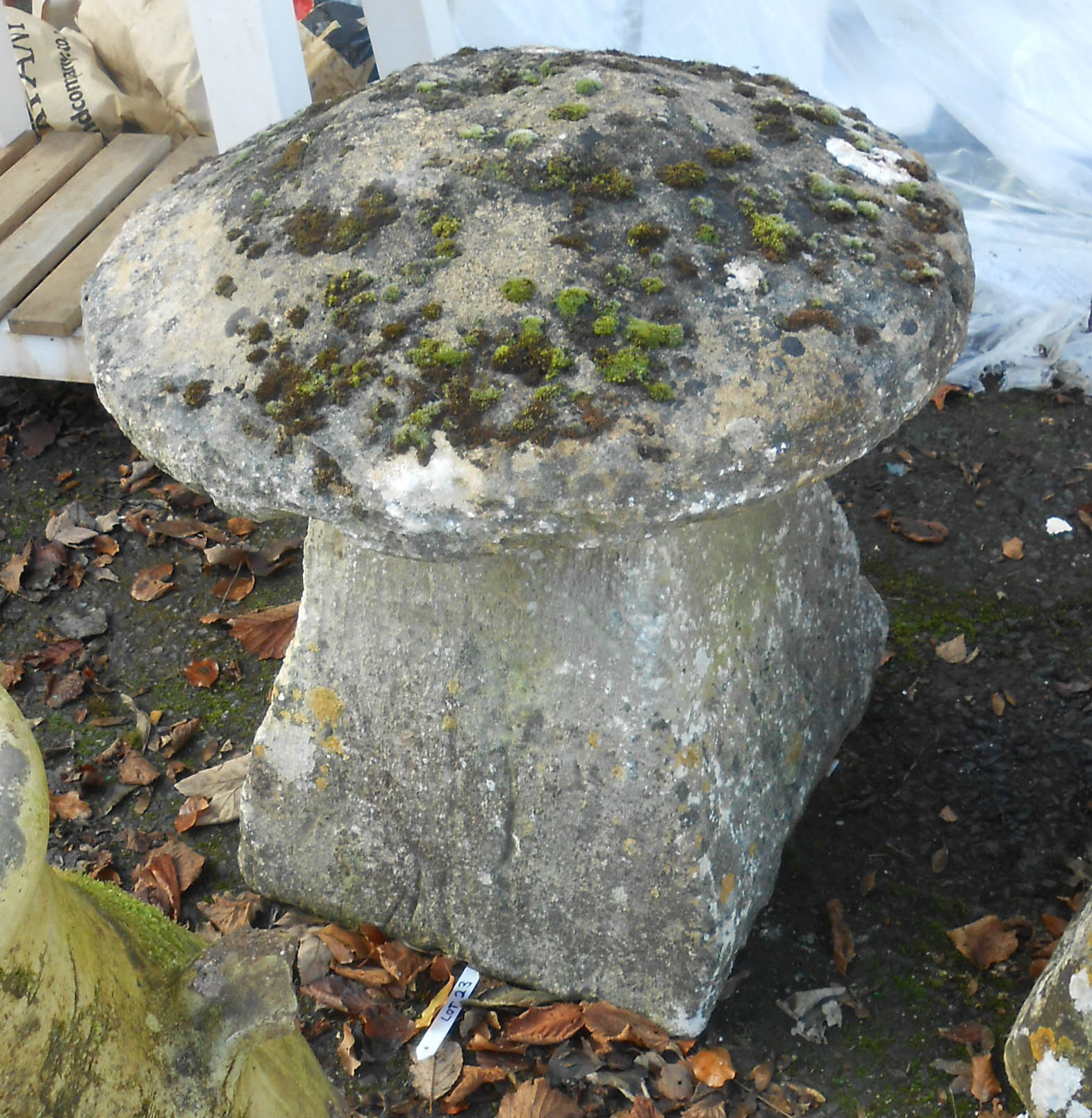A Coltswold stone staddle and top