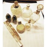 A collection of scent bottles including silver topped, silver banded and a pair of Oriental
