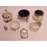 A small collection of silver items comprising mustard pot (hinge pin missing), salt, vesta, two