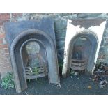 Two Victorian cast iron arched top bedroom fireplace inserts