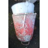 Two vintage painted metal bell shaped fire buckets - one with later finish and handle missing