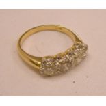 A marked 18ct. yellow metal four stone diamond ring - 1.75ct. TDW