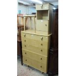 A part suite of retro bedroom furniture, comprising a 34 1/2" chest of five long graduated