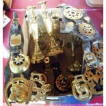 A quantity of brassware including candlesticks, duck ornament, horse brasses, etc.