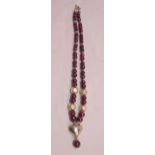 A Hill Tribe silver and faceted heat treated ruby bead necklace