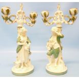 A pair of 14" antique English porcelain twin branch candelabra with screw threaded sconces and