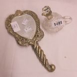 A Victorian silver and white metal ornate hand mirror with pierced border, heart shaped plate and