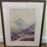 H. J. Beare: a gilt framed watercolour depicting a highland scene with couple on a track and