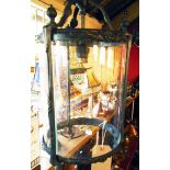 A reproduction Edwardian hall lamp with curved glass panes - one missing