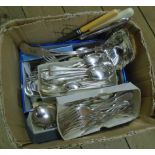 A box containing a large quantity of silver plated and other cutlery, including large kings