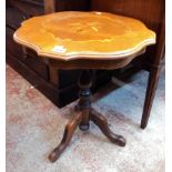 A reproduction inlaid pedestal table, set on turned pillar and tripod base