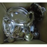 A box containing a quantity of silver plated items including entree dishes, footed bowl, serving