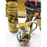 Three Torquay Pottery scroll jugs
