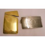 A silver gilt card case - Birmingham 1925 - sold with another with engine turned decoration