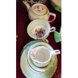 A Hammersley & Co. bone china part tea set including teapot, sugar bowl, and jug