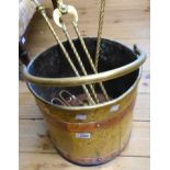 A brass and copper bound log bucket - sold with a set of three brass fire tools and fire tongs