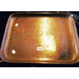 A 20 1/4" heavy copper tray with hammered and beaded decoration