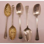 A pair of Hester Bateman silver parcel gilt berry spoons with C-scroll decorated stems and blank