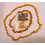 A single string of roughly shaped butterscotch amber beads - sold with an orange amber similar and