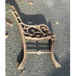 A pair of modern cast iron bench ends