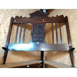 A 4' 6" early 20th Century carved walnut bed frame with Vono side rails