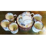 Six Minton's coffee cans with saucers