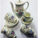 A Royal Doulton Chelsea Rose pattern coffee set including pot